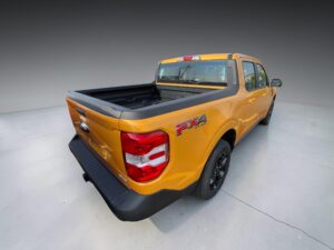 Ford Maverick Orange Rear showroom